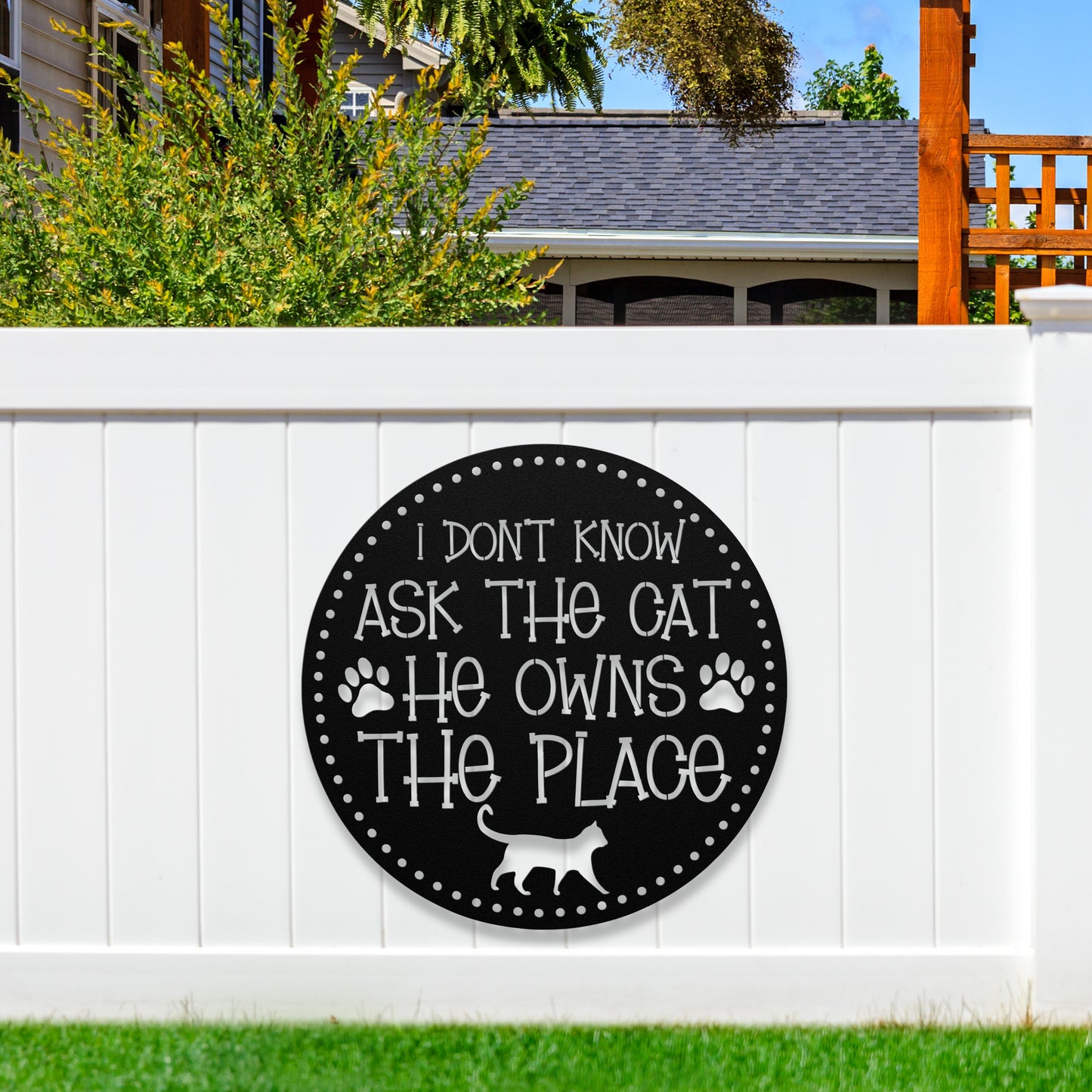I Don’t Know, Ask the Cat, He Owns the Place’ customizable metal sign, pet-themed wall decor for cat lovers, durable 18-gauge steel in five colors, perfect for indoor or outdoor use. Shown in Black.