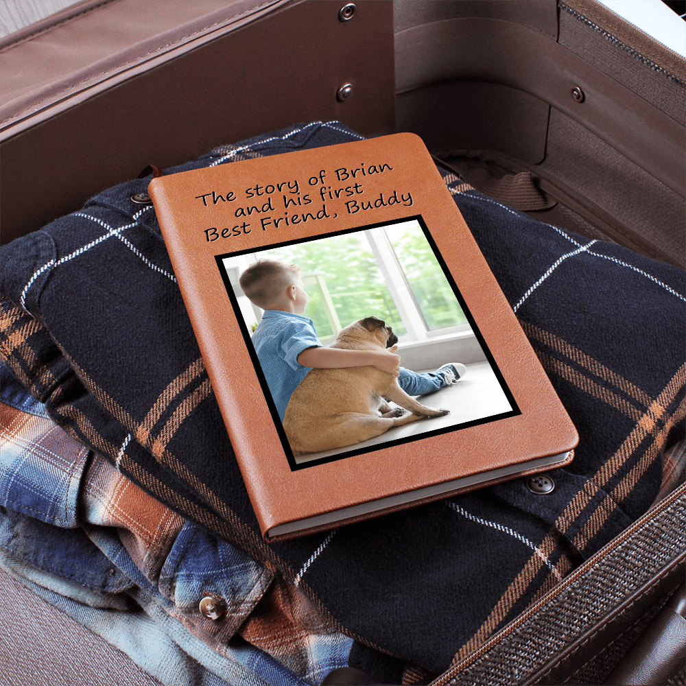 Personalized pet and child journal being placed in a bag for travel