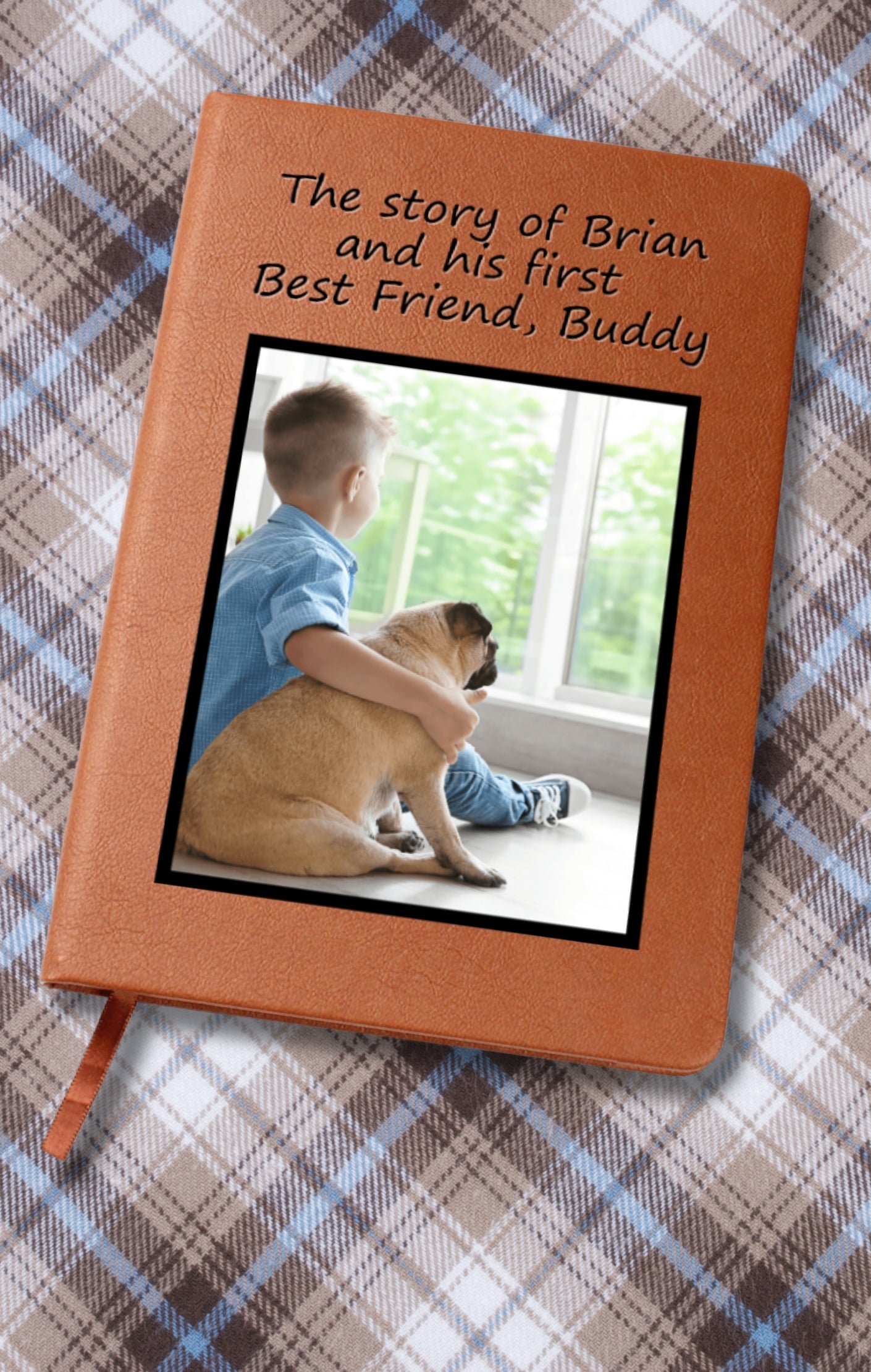Memory journal for baby and dog placed on a soft baby blanket