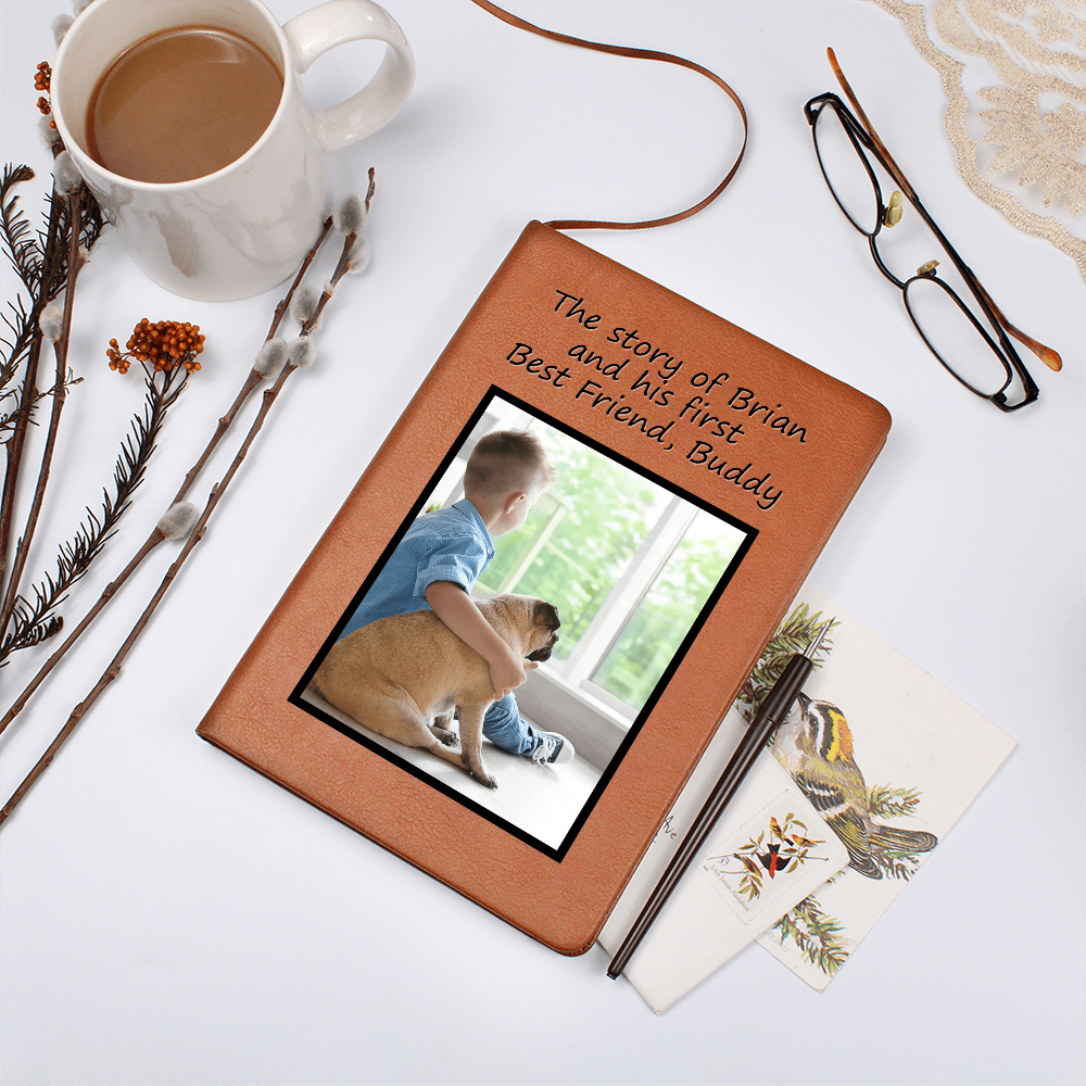 Journal for pet and child memories displayed next to a cup of coffee and pen on a table