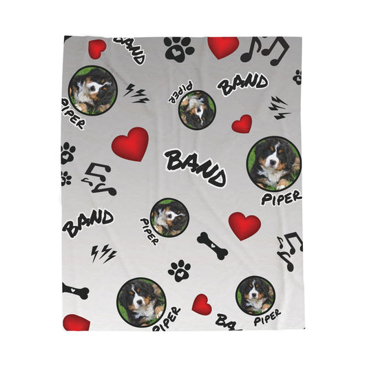 Flat lay of personalized dog blanket featuring pet photos, red hearts, music notes, and the word "Band" — great for teen band members or pet lovers