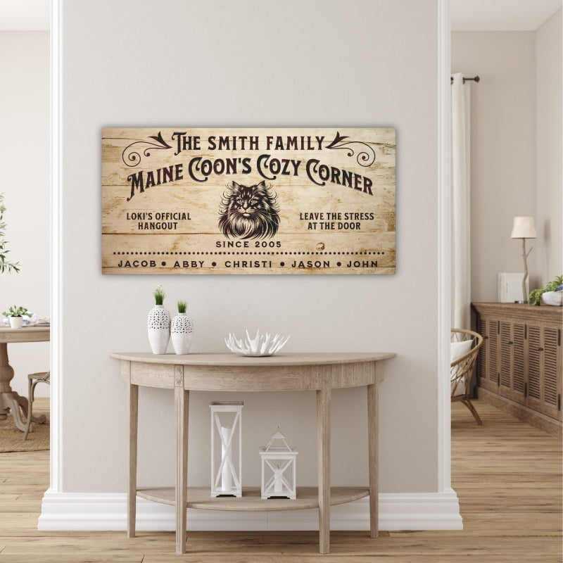 Custom family name, Maine Coon's Cozy corner with a picture of a Main Coon Head, Cat's Name Official Hangout, Leave the stress at the door, established date, and family names.