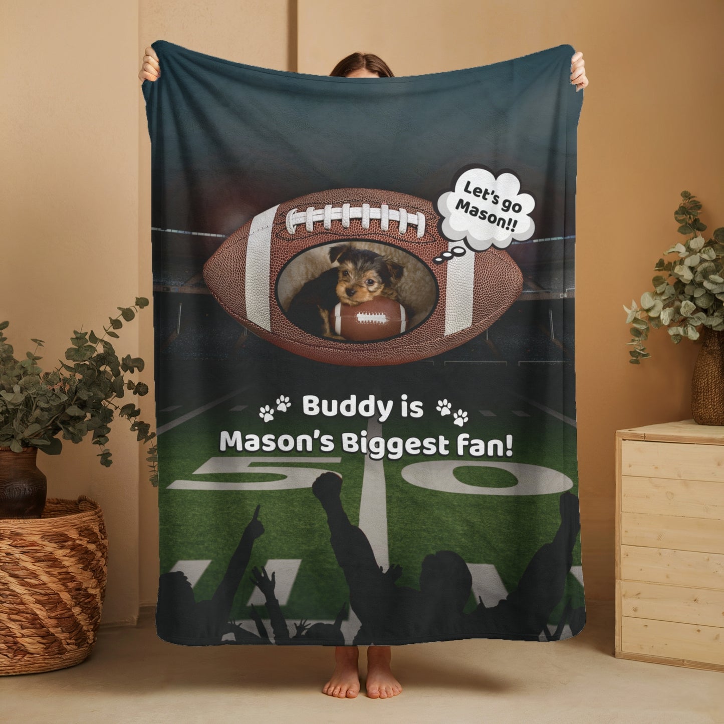Personalized football blanket held up for display, featuring a dog with a football and the text “Buddy is Mason’s Biggest Fan” — a cozy and spirited gift for young athletes and pet lovers