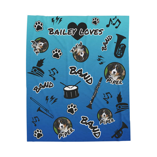 Angled view of personalized Pep Rally Blue band blanket with dog photo and student name