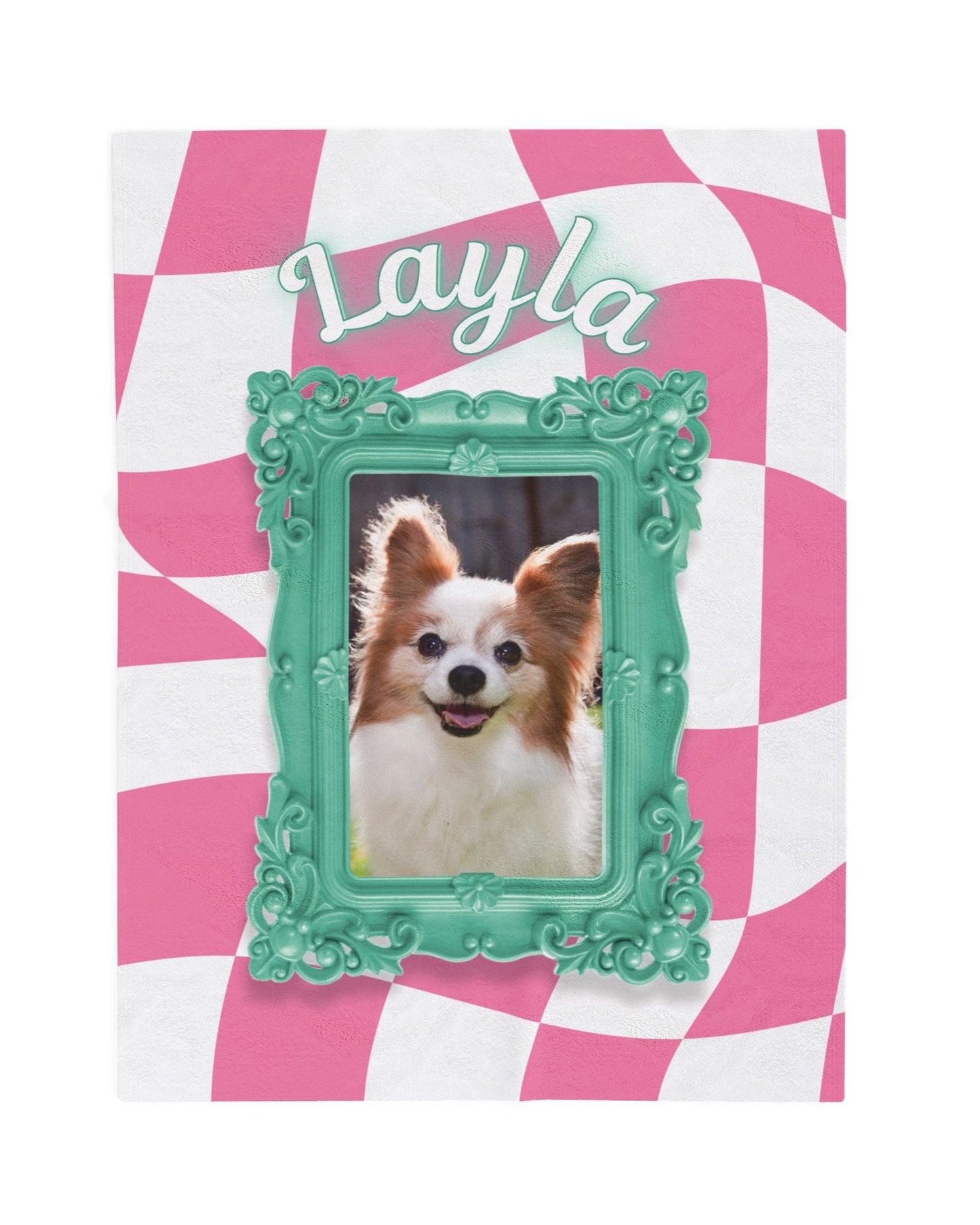 Full view of a personalized pet blanket with pink checkered background, the name Layla, and framed dog photo in teal green