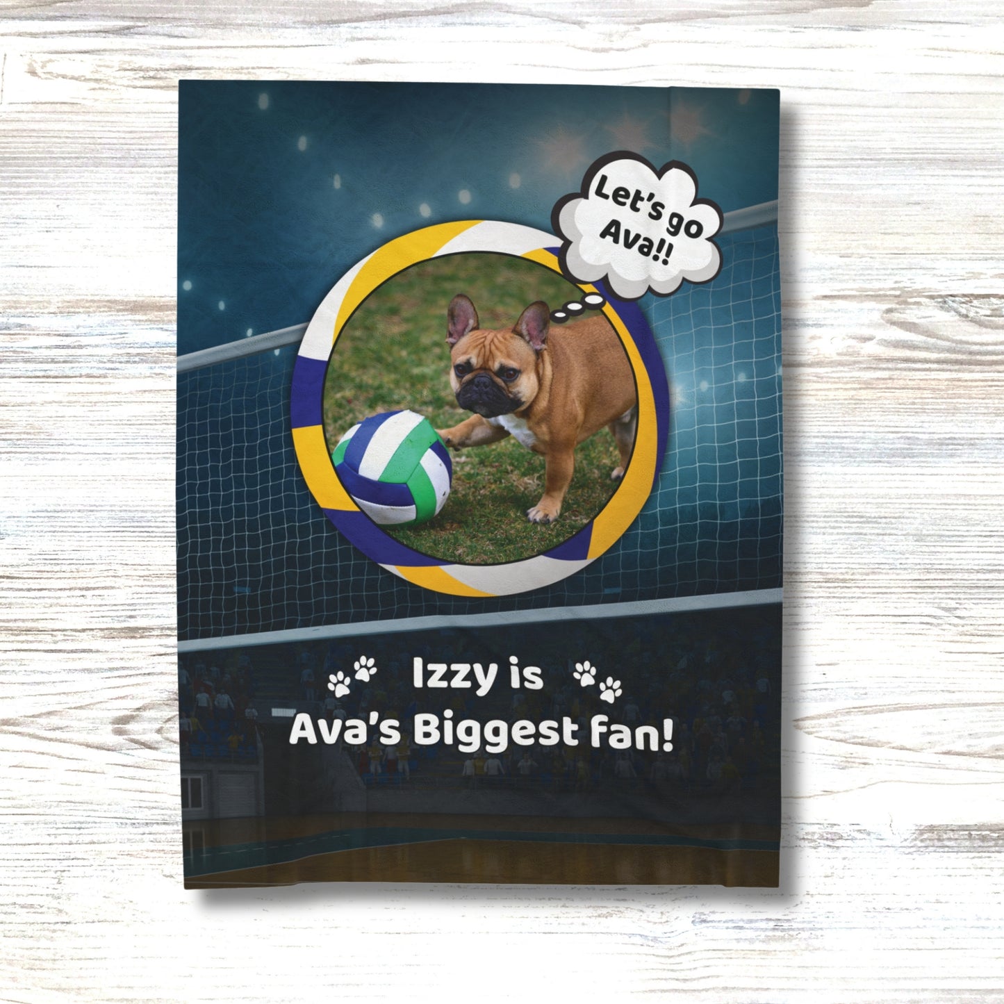 Custom volleyball dog blanket with French Bulldog named Izzy, shown on white wood background, personalized pet gift for volleyball lovers.