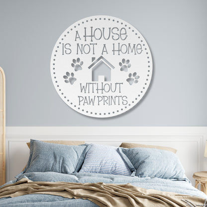 A House is Not a Home Without Paw Prints’ metal sign, durable 18-gauge steel wall decor for pet lovers, available in Black, Red, White, Copper, or Silver, perfect for indoor or outdoor display.-shown in white.