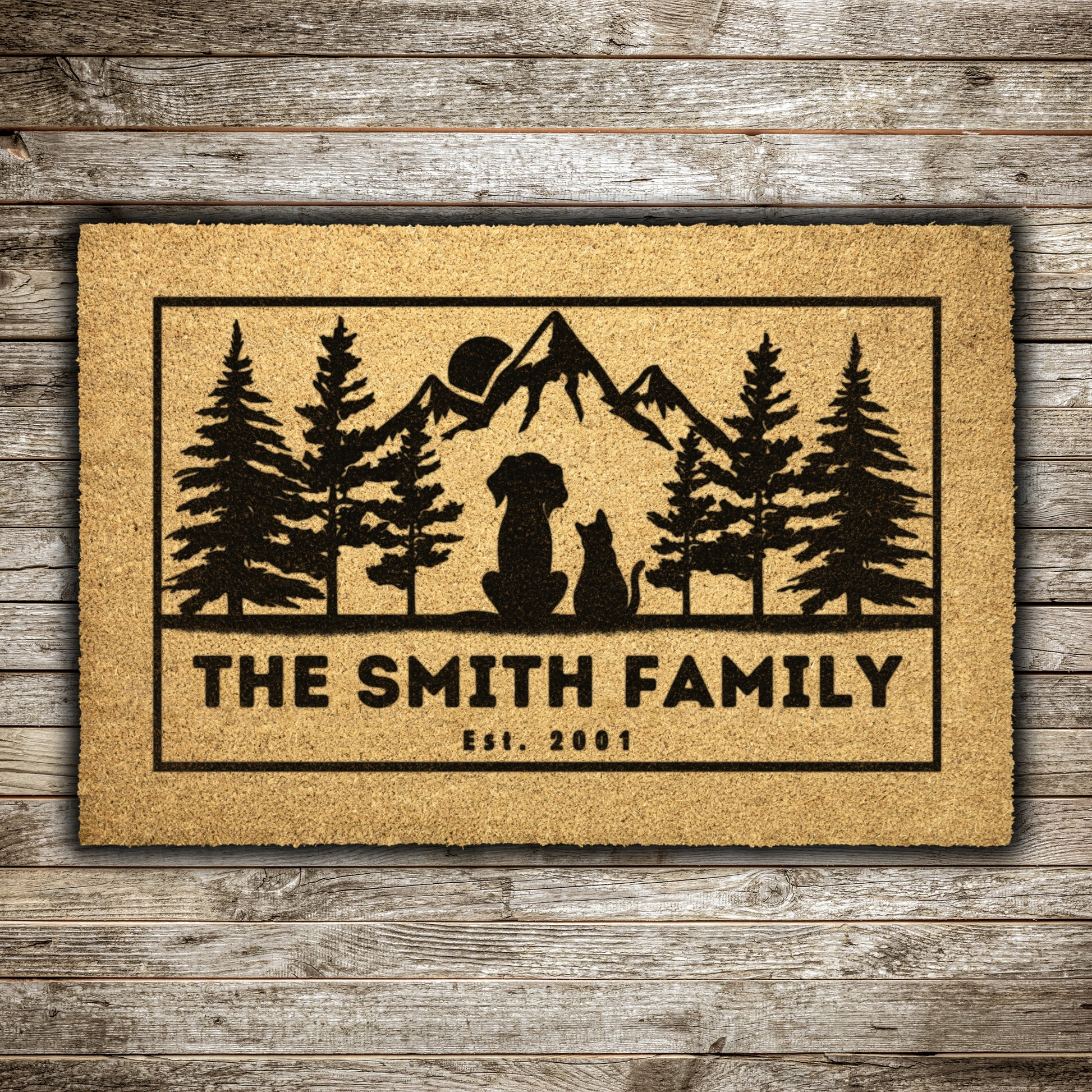 Dog and cat admire mountains customizable coir rug, personalized doormat with family name, durable and fade-resistant, ideal for pet-friendly entryways with a scenic mountain design.