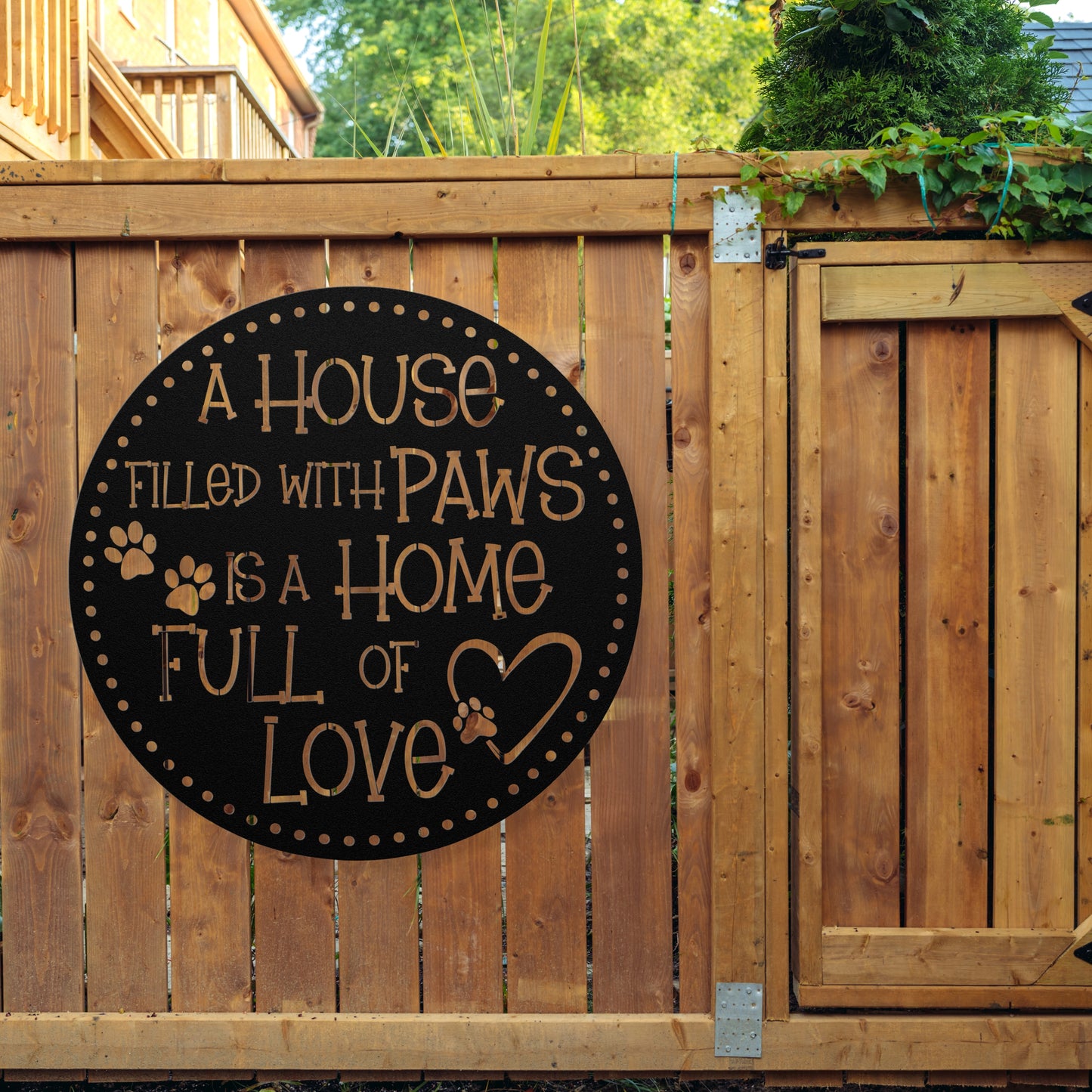 A House Filled with Paws is a Home Full of Love’ metal sign, durable 18-gauge steel wall decor for pet lovers, suitable for indoor or outdoor display. Shown in Black.