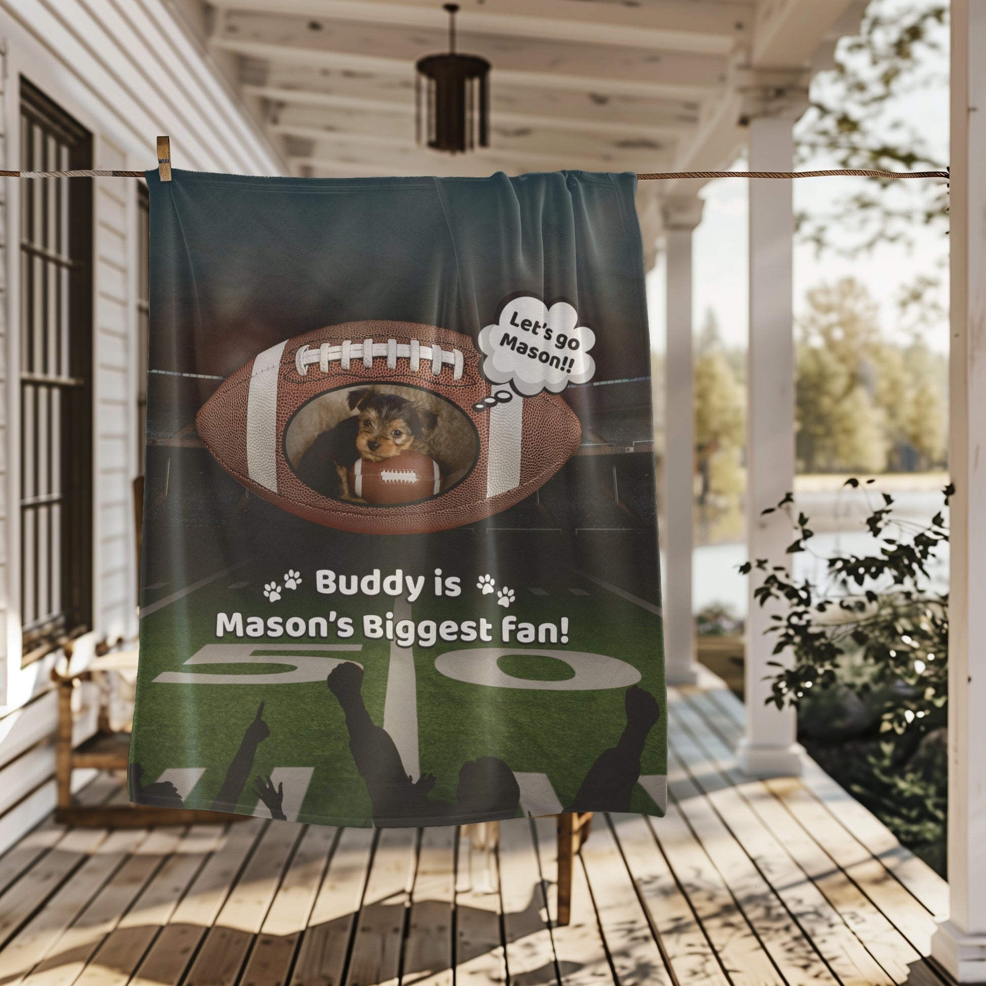 Personalized football-themed pet blanket hanging on a porch clothesline, featuring a dog in a football design and the text “Buddy is Mason’s Biggest Fan” — ideal for pet parents and football families