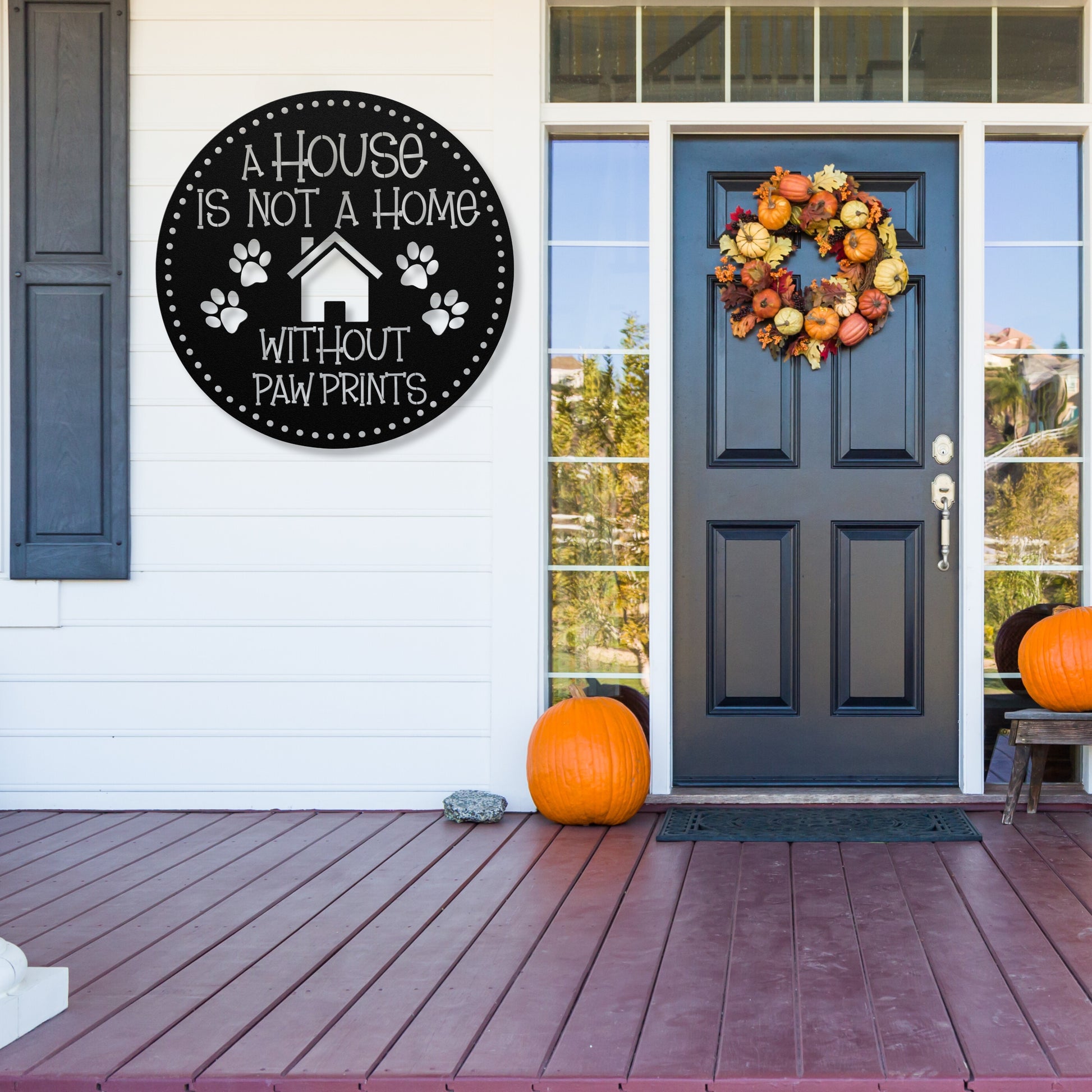 A House is Not a Home Without Paw Prints’ metal sign, durable 18-gauge steel wall decor for pet lovers, available in Black, Red, White, Copper, or Silver, perfect for indoor or outdoor display.-shown in black.