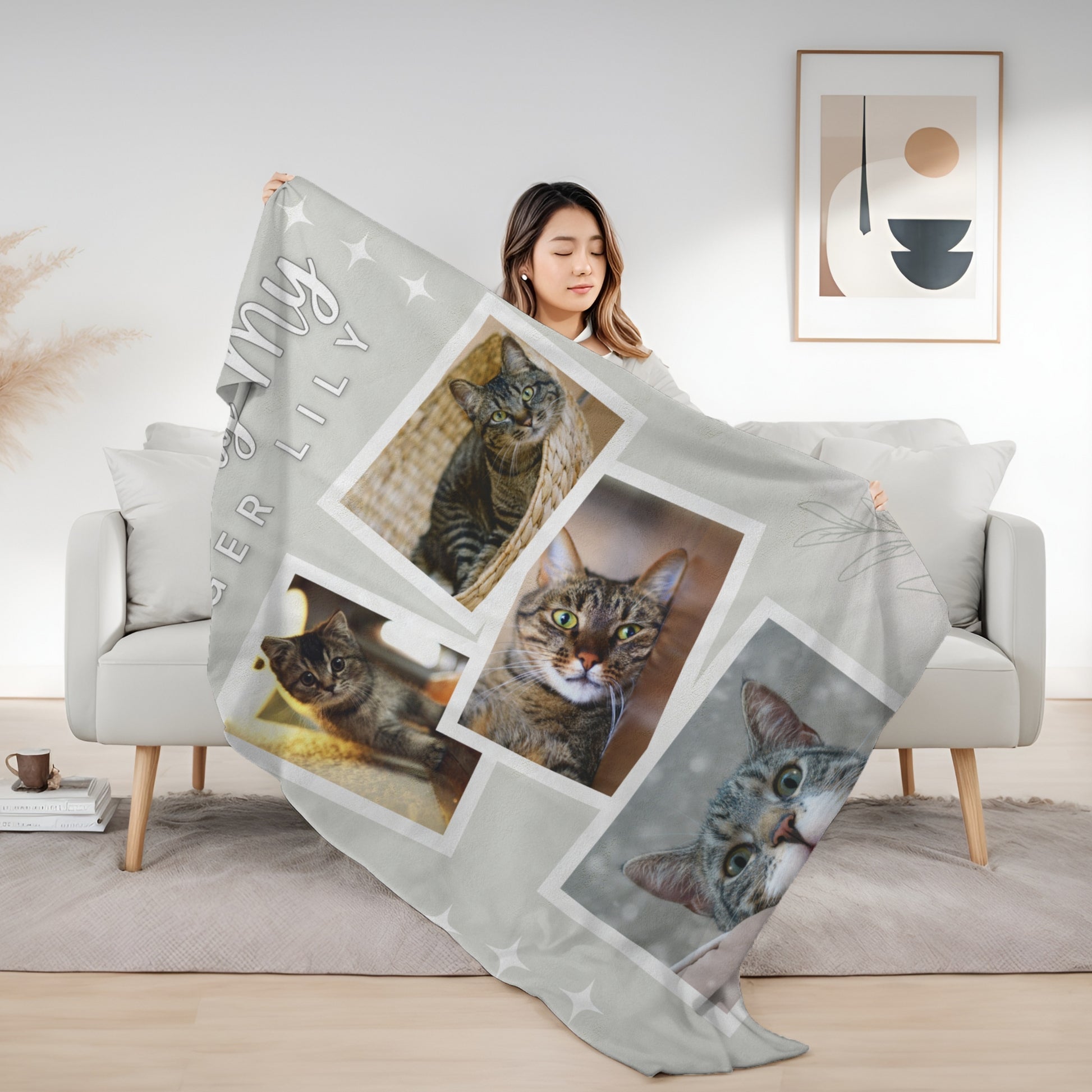 Woman holding personalized cat memorial blanket with “Missing My Tiger Lily” design and four tabby cat photos, soft fleece tribute for pet loss comfort