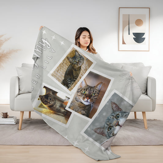 Woman holding personalized cat memorial blanket with “Missing My Tiger Lily” design and four tabby cat photos, soft fleece tribute for pet loss comfort