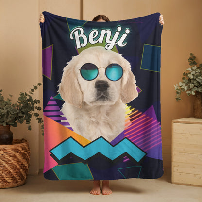 Custom dog blanket with retro neon design, featuring pet name Benji and dog wearing sunglasses, held up for full display indoors